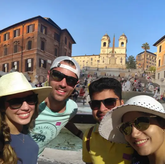Happy young people enjoying the Spanish Steps during the Real Rome Tours Rome in a Day Tour