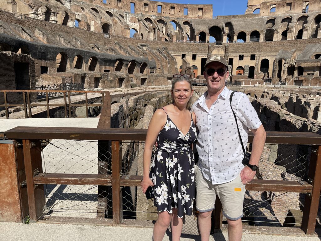 Couple enjoying a Private Tour of the Colosseum Arena with Real Rome Tours 