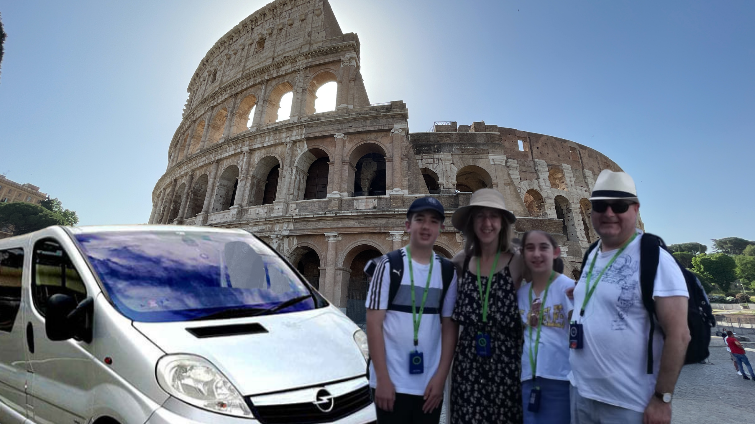 Family standing outside the Colosseum by a minivan
