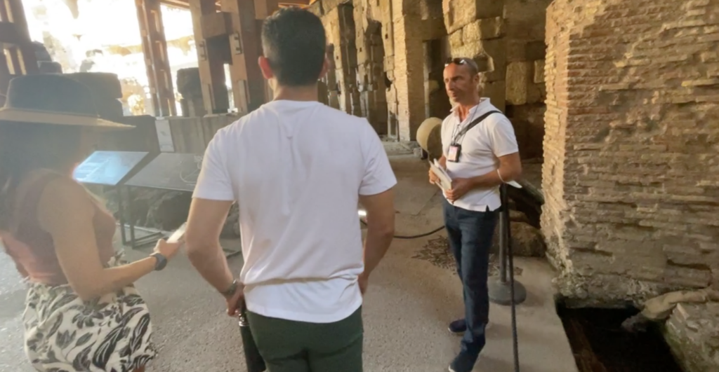 tour guide max explains the drainage system at the colosseum underground